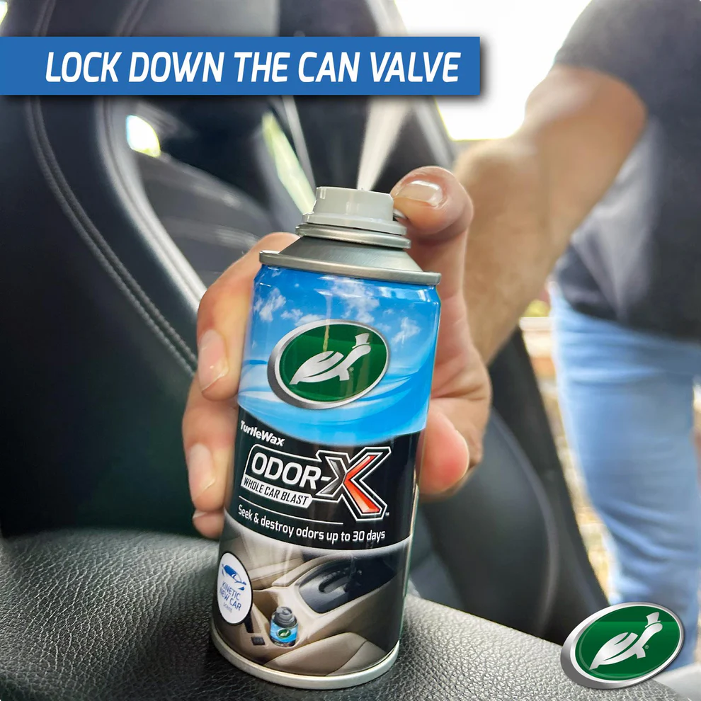 Lock down the Turtle Wax Odor-X Whole Car Blast can valve to release the mist